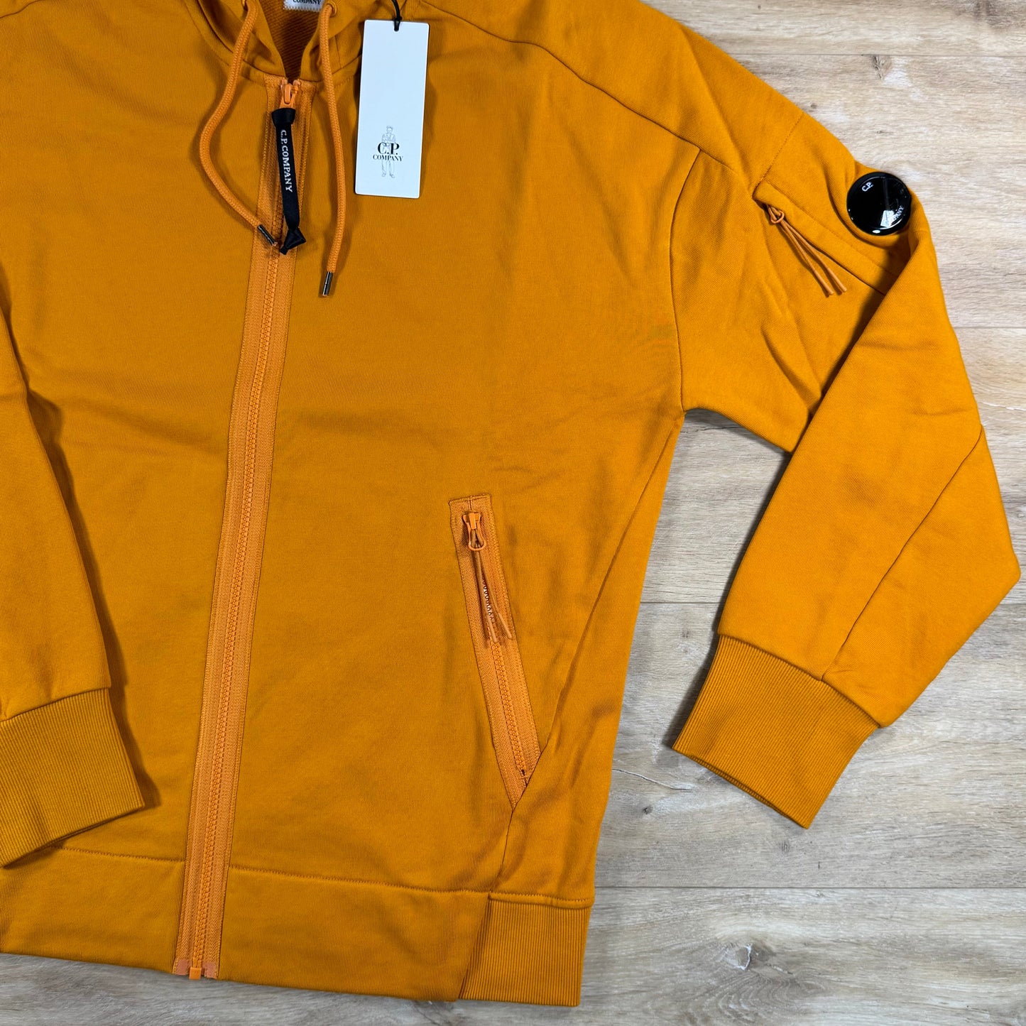 C.P. Company Diagonal Raised Zipped Lens Hoodie in Desert Sun