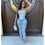 Load image into Gallery viewer, Posh ripped jeans (Light wash)