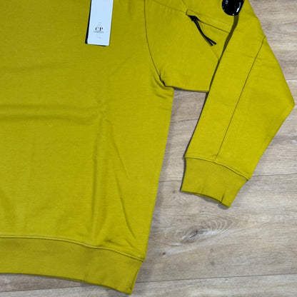 C.P. Company Diagonal Raised Fleece Crewneck Lens Sweatshirt in Antique Moss - Yellow