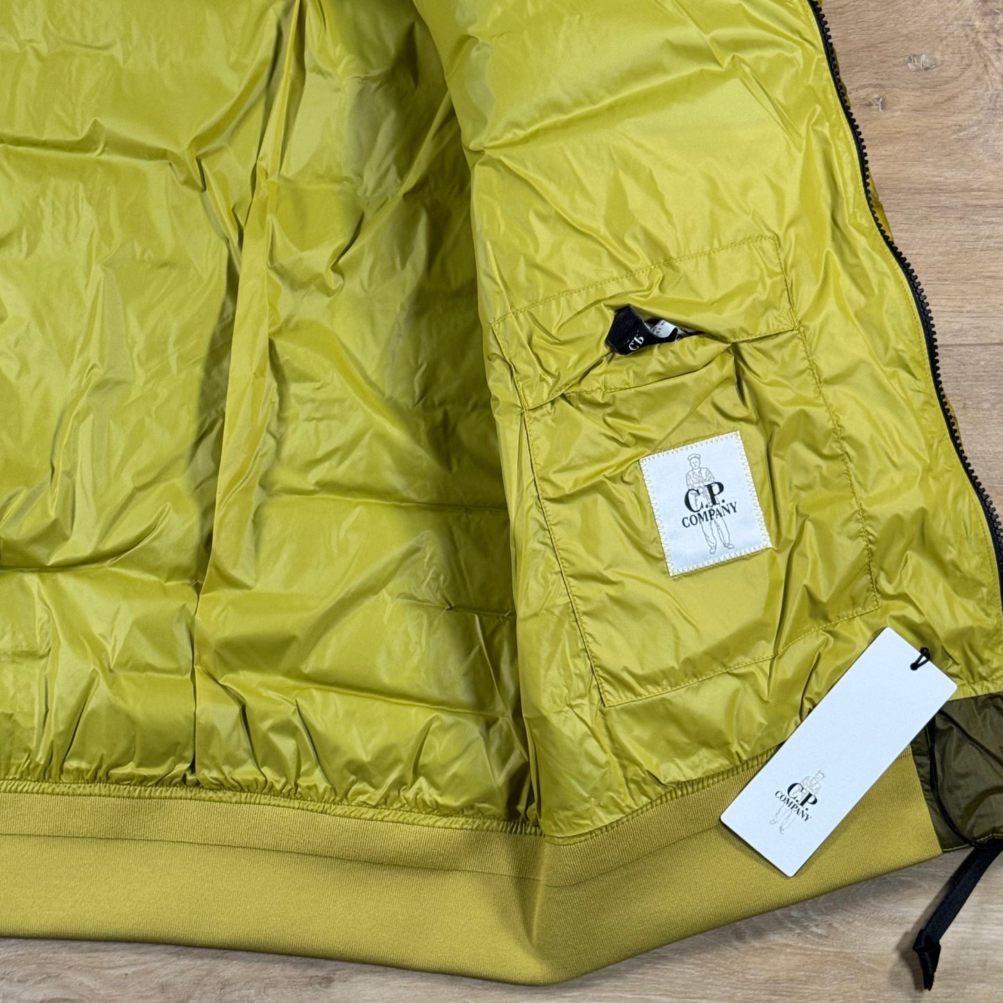C.P. Company D.D. Shell Lens Down Jacket in Antique Moss - Yellow