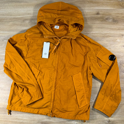 C.P. Company Twill Hooded Lens Jacket in Desert Sun - Orange
