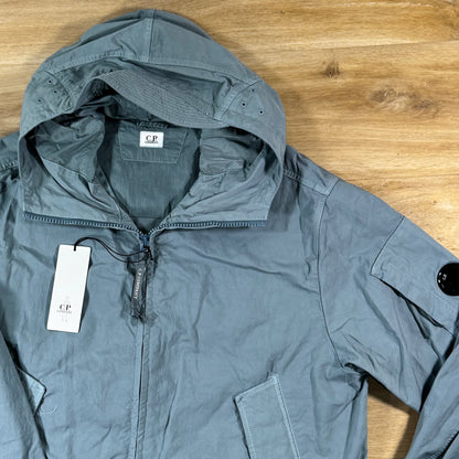 C.P. Company Twill Hooded Lens Jacket in Silver Blue