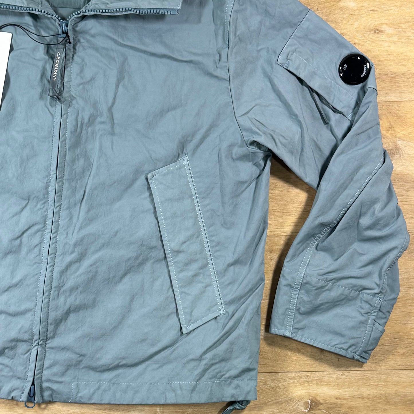 C.P. Company Twill Hooded Lens Jacket in Silver Blue