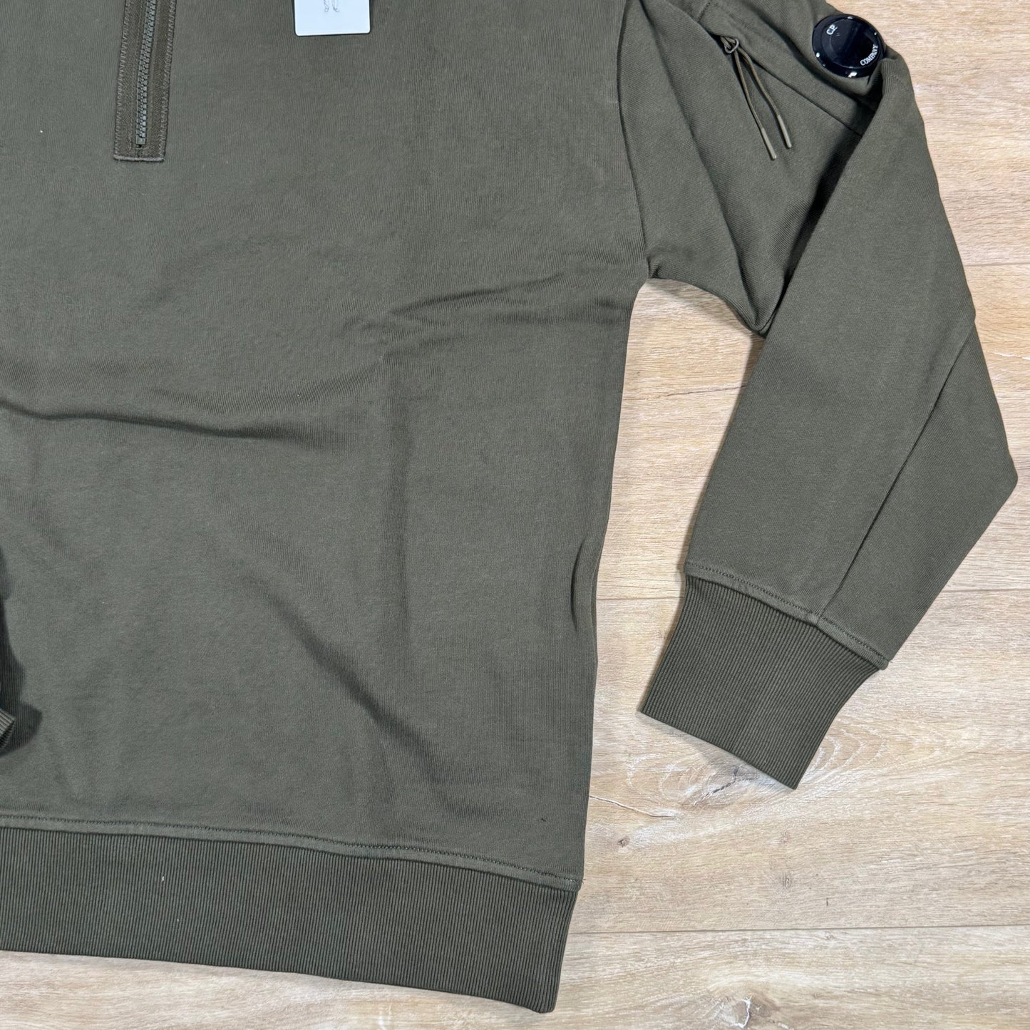 C.P. Company Diagonal Raised Half-Zip Lens Sweatshirt in Ivy Green