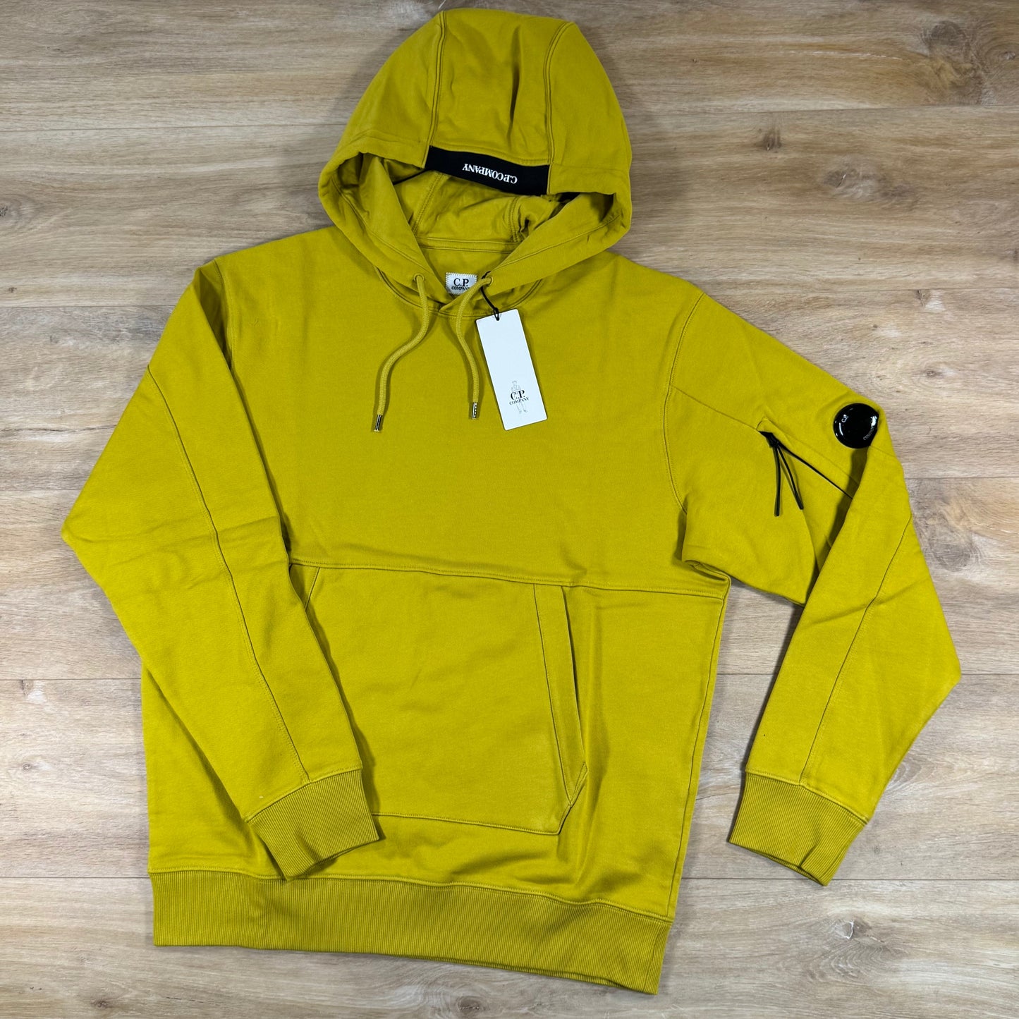 C.P. Company Diagonal Raised Fleece Lens Hoodie in Antique Moss - Yellow