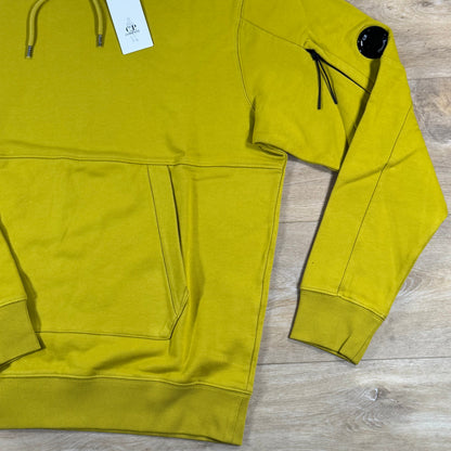 C.P. Company Diagonal Raised Fleece Lens Hoodie in Antique Moss - Yellow