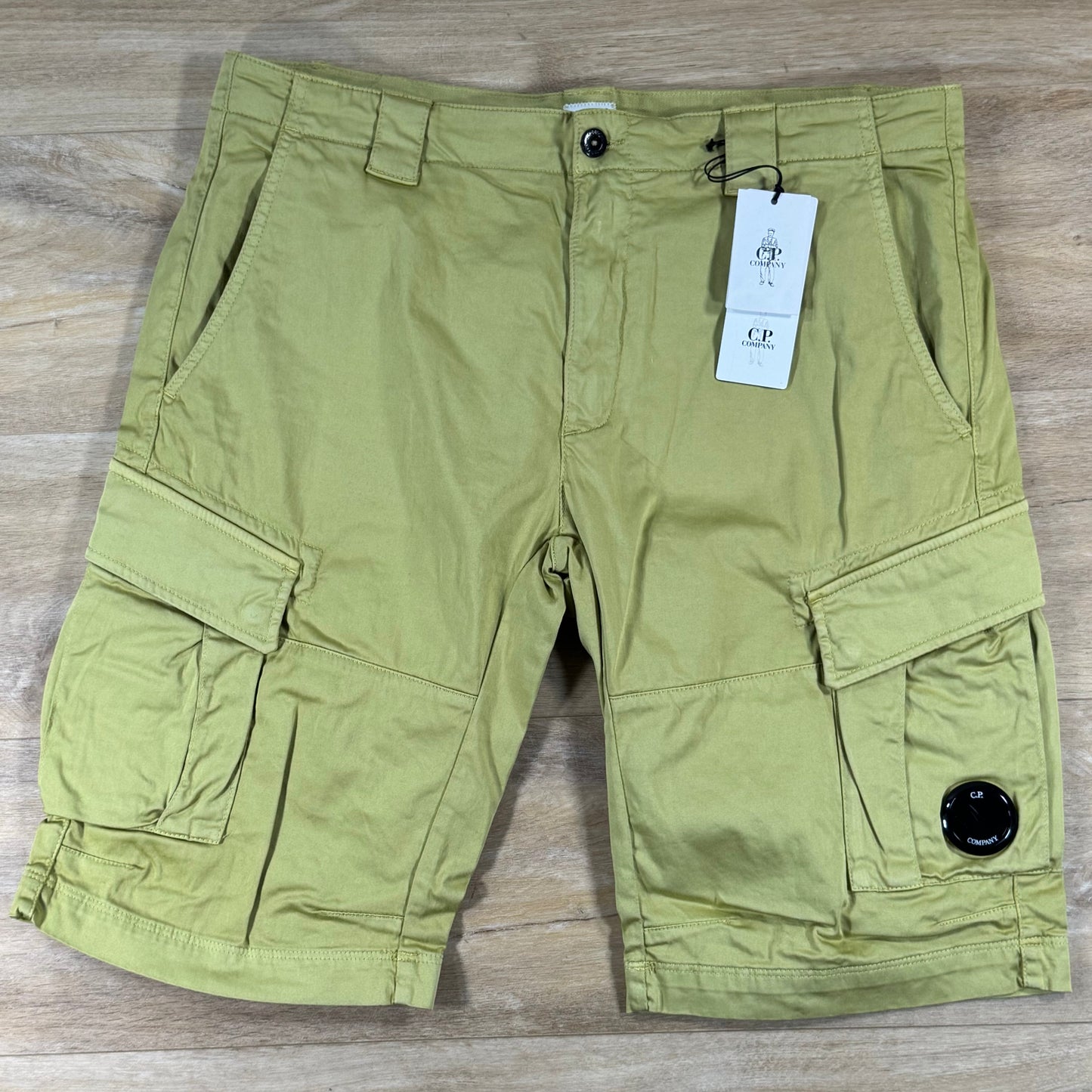 C.P. Company Stretch Sateen Cargo Lens Shorts in Burnished Gold