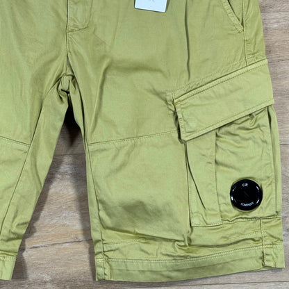 C.P. Company Stretch Sateen Cargo Lens Shorts in Burnished Gold