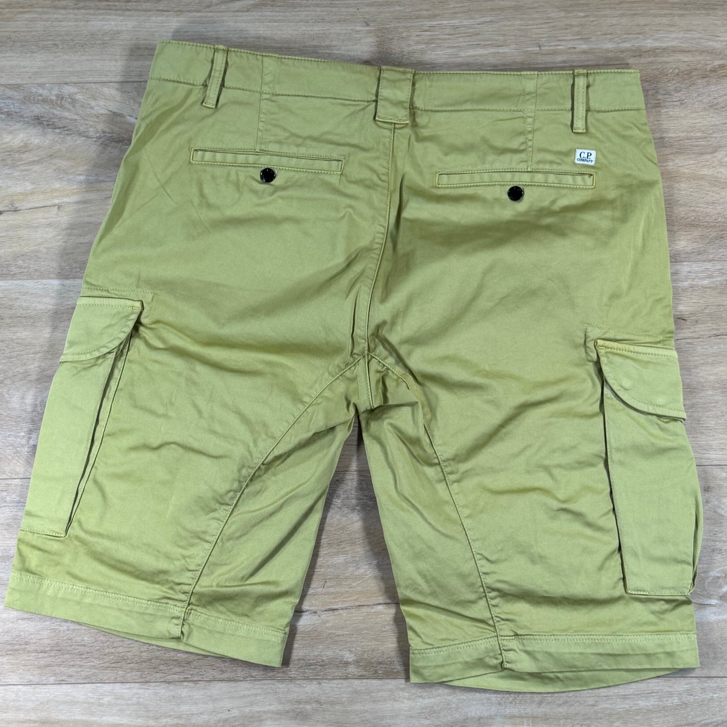 C.P. Company Stretch Sateen Cargo Lens Shorts in Burnished Gold