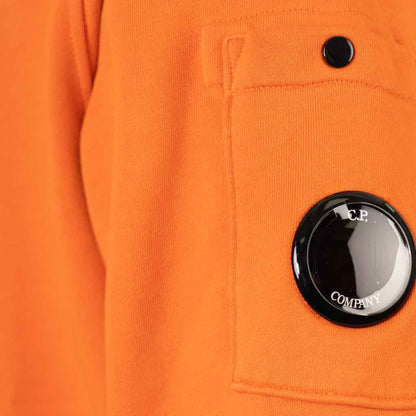 [C.P. Company] Resist Dyed Lens Hoodie in Orange