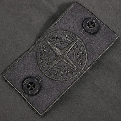 [Stone Island] Ghost Flannel Loose Fit Trousers with Elasticated Zipped Cuffs in Dark Grey